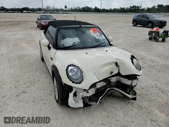 2017 MINI Convertible Cooper z VIN WMWWG5C32H3C20341, wystawiony jako Copart lot #57039685 z przebiegiem 100 575 mil mil oraz Szkoda całkowita • Salvage title. Historia ofert i sprzedaży dostępna na DreamBid. Obrazek 14.