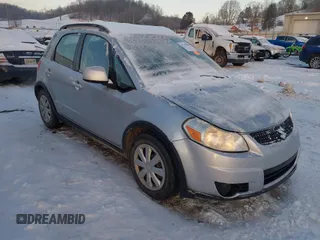 2011 Suzuki SX4 Crossover with VIN JS2YB5A36B6305317, listed as a IAAI auction lot 41333007 with 84,967 mi miles. Bid and sale history available at carsss.com. Image 1.
