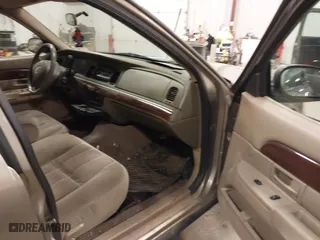 2004 Mercury Grand Marquis GS with VIN 2MEFM74W04X618043, listed as a IAAI auction lot 41985566 with 192,836 mi miles. Bid and sale history available at carsss.com. Image 5.