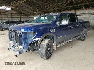 2021 Nissan Titan Pro-4X with VIN 1N6AA1FB9MN517769, listed as a Copart auction lot 50117935 with 35,949 mi miles and Salvage title. Bid and sale history available at DreamBid. Image 1.