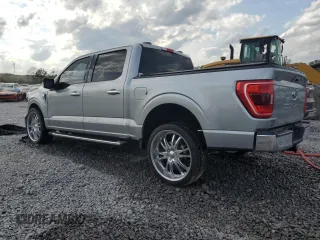 2023 Ford F-150 XL with VIN 1FTEW1C50PKF91124, listed as a Copart auction lot 51538865 with 22,128 mi miles and Salvage title. Bid and sale history available at DreamBid. Image 2.
