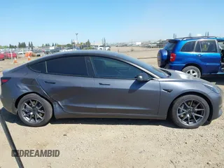 2023 Tesla Model 3 z VIN 5YJ3E1EA2PF404614, wystawiony jako IAAI lot #42009539 z przebiegiem 22 105 mil mil oraz . Historia ofert i sprzedaży dostępna na DreamBid. Obrazek 12.