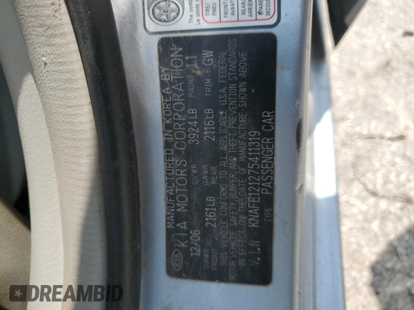 2007 Kia Spectra EX with VIN KNAFE121275411319, listed as a Copart auction lot 58716045 with 309,488 mi miles and Salvage title. Bid and sale history available at DreamBid. Image 12.