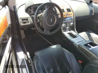 2009 Aston Martin DB9 z VIN SCFAD01E59GA10941, wystawiony jako Copart lot #57220313 z przebiegiem 24 818 mil mil oraz . Historia ofert i sprzedaży dostępna na DreamBid. Obrazek 8.