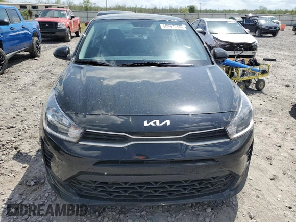 2023 Kia Rio LX with VIN 3KPA24AD7PE576869, listed as a Copart auction lot 50861285 with 18,044 mi miles and Salvage Title. Bid and sale history available at DreamBid. Image 5.