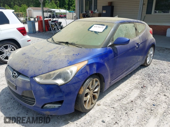 2012 Hyundai Veloster w/Gray Int with VIN KMHTC6AD7CU050444, listed as a IAAI auction lot 42170272 with 121,478 mi miles and . Bid and sale history available at DreamBid. Image 2.