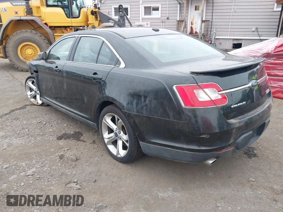2010 Ford Taurus SHO with VIN 1FAHP2KT7AG132561, listed as a IAAI auction lot 31602484 with 118,333 mi miles and . Bid and sale history available at DreamBid. Image 3.