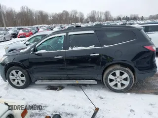 2016 Chevrolet Traverse LT with VIN 1GNKVGKDXGJ339394, listed as a IAAI auction lot 41709558 with 128,945 mi miles and . Bid and sale history available at DreamBid. Image 14.