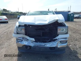 2017 GMC Sierra 1500 SLE z VIN 1GTV2MEC0HZ291794, wystawiony jako IAAI lot #42055172 z przebiegiem 235 969 mil mil oraz . Historia ofert i sprzedaży dostępna na DreamBid. Obrazek 6.