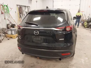 2017 Mazda CX-9 Touring with VIN JM3TCBCY8H0128734, listed as a IAAI auction lot 41256313 with 166,353 mi miles. Bid and sale history available at carsss.com. Image 16.