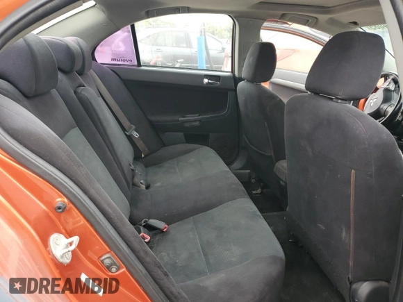 2009 Mitsubishi Lancer GTS z VIN JA3AU86W59U015875, wystawiony jako Copart lot #59764085 z przebiegiem 232 724 mil mil oraz Czysty tytuł • Clean title. Historia ofert i sprzedaży dostępna na DreamBid. Obrazek 10.
