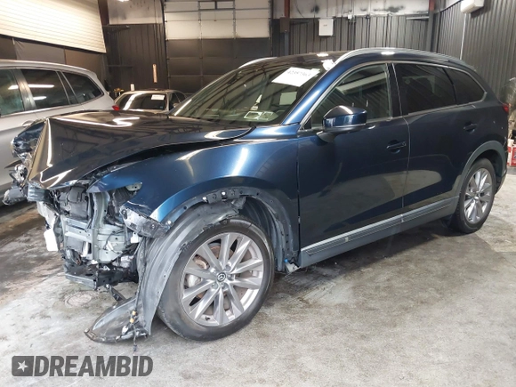 2020 Mazda CX-9 Grand Touring with VIN JM3TCBDY4L0403376, listed as a IAAI auction lot 42357363 with 86,716 mi miles and . Bid and sale history available at DreamBid. Image 2.