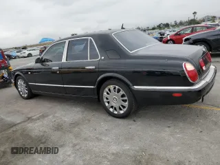 2005 Bentley Arnage R with VIN SCBLC37F95CX10586, listed as a Copart auction lot 55852485 with 38,584 mi miles and Salvage Title. Bid and sale history available at DreamBid. Image 2.