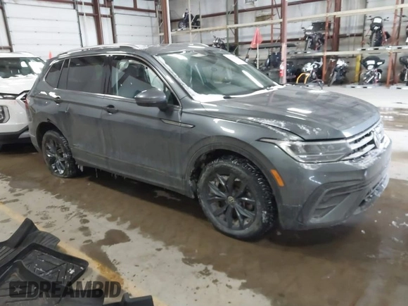 2023 Volkswagen Tiguan SE with VIN 3VVMB7AX5PM013447, listed as a IAAI auction lot 41615200 with 66,259 mi miles and . Bid and sale history available at DreamBid. Image 1.