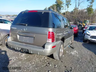 2003 Mercury Mountaineer Convenience with VIN 4M2DU66W93UJ19077, listed as a IAAI auction lot 41296559 with 164,143 mi miles. Bid and sale history available at carsss.com. Image 4.