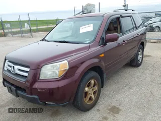 2007 Honda Pilot EX-L with VIN 5FNYF18537B021184, listed as a IAAI auction lot 42142092 with 245,462 mi miles. Bid and sale history available at carsss.com. Image 2.