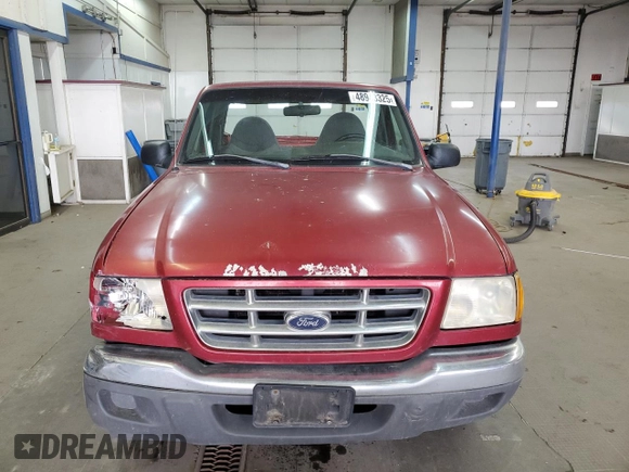 2001 Ford Ranger XL with VIN 1FTYR10C61TA40124, listed as a Copart auction lot 48943325 with 196,810 mi miles and Salvage title. Bid and sale history available at DreamBid. Image 5.
