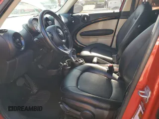 2014 MINI Countryman with VIN WMWZB3C56EWR41819, listed as a Copart auction lot 48149985 with 93,784 mi miles and Salvage Title. Bid and sale history available at DreamBid. Image 7.