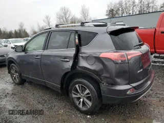 2018 Toyota RAV4 XLE with VIN JTMRFREV0JJ200337, listed as a Copart auction lot 84901594 with 57,301 mi miles and Salvage Title. Bid and sale history available at DreamBid. Image 2.