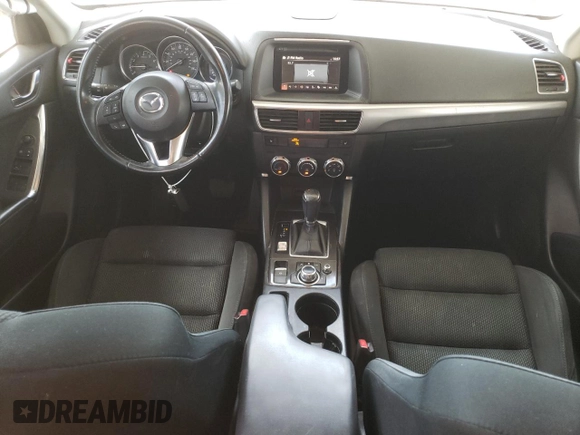 2016 Mazda CX-5 Touring z VIN JM3KE2CY4G0805072, wystawiony jako Copart lot #58435535 z przebiegiem 146 323 mil mil oraz Szkoda całkowita • Salvage title. Historia ofert i sprzedaży dostępna na DreamBid. Obrazek 8.