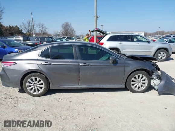 2019 Toyota Camry LE with VIN 4T1B11HK9KU810347, listed as a IAAI auction lot 41804007 with 75,063 mi miles and . Bid and sale history available at DreamBid. Image 14.