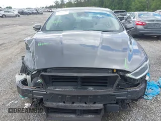 2019 Ford Fusion Titanium with VIN 3FA6P0SU9KR126985, listed as a IAAI auction lot 42255509 with 138,779 mi miles and . Bid and sale history available at DreamBid. Image 12.
