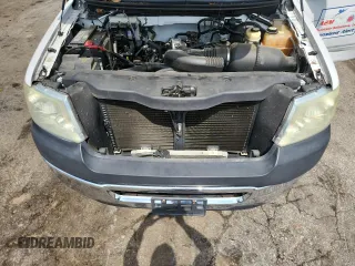 2007 Ford F-150 STX with VIN 1FTRX12W07NA02984, listed as a Copart auction lot 60305325 with 127,731 mi miles and Salvage title. Bid and sale history available at DreamBid. Image 11.