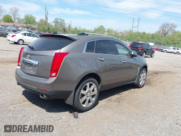 2011 Cadillac SRX Premium Collection with VIN 3GYFNFEY7BS519548, listed as a IAAI auction lot 42097305 with 124,083 mi miles and . Bid and sale history available at DreamBid. Image 4.