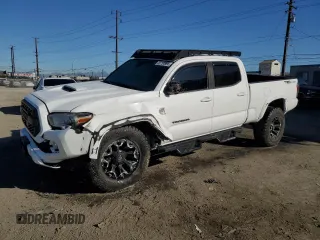 2020 Toyota Tacoma SR5 with VIN 3TMBZ5DN2LM025694, listed as a Copart auction lot 86754834 with 72,459 mi miles and Salvage title. Bid and sale history available at DreamBid. Image 1.