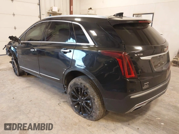 2021 Cadillac XT5 AWD Premium Luxury with VIN 1GYKNDR41MZ129884, listed as a IAAI auction lot 41835444 with 61,878 mi miles and . Bid and sale history available at DreamBid. Image 3.