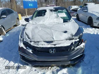 2020 Honda Civic LX z VIN 2HGFC2F64LH580766, wystawiony jako IAAI lot #41597161 z przebiegiem 10 828 mil mil oraz . Historia ofert i sprzedaży dostępna na DreamBid. Obrazek 13.
