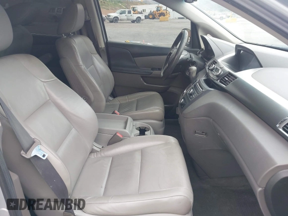 2014 Honda Odyssey LX z VIN 5FNRL5H28EB064426, wystawiony jako IAAI lot #42207634 z przebiegiem 169 706 mil mil oraz . Historia ofert i sprzedaży dostępna na DreamBid. Obrazek 5.