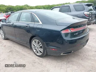 2014 Lincoln MKZ with VIN 3LN6L2G97ER804381, listed as a IAAI auction lot 42277543 with 120,907 mi miles and . Bid and sale history available at DreamBid. Image 3.
