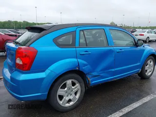 2009 Dodge Caliber SXT z VIN 1B3HB48A39D163685, wystawiony jako IAAI lot #42193202 z przebiegiem 97 479 mil mil oraz . Historia ofert i sprzedaży dostępna na DreamBid. Obrazek 6.