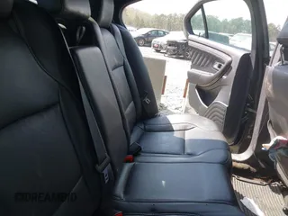 2014 Ford Taurus Limited with VIN 1FAHP2F80EG105147, listed as a IAAI auction lot 41899174 with 137,451 mi miles and . Bid and sale history available at DreamBid. Image 8.