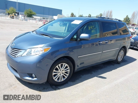 2014 Toyota Sienna XLE with VIN 5TDYK3DC5ES447155, listed as a IAAI auction lot 42003951 with 60,064 mi miles and . Bid and sale history available at DreamBid. Image 17.