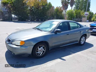 2004 Pontiac Grand Am SE1 with VIN 1G2NF52E84C214785, listed as a IAAI auction lot 42529688 with 124,415 mi miles and . Bid and sale history available at DreamBid. Image 2.