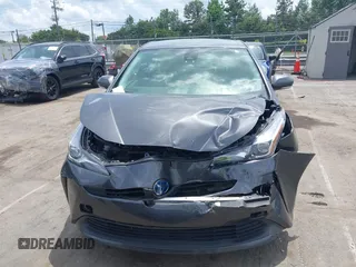 2021 Toyota Prius L Eco z VIN JTDKAMFU3M3152785, wystawiony jako IAAI lot #42501351 z przebiegiem 60 489 mil mil oraz . Historia ofert i sprzedaży dostępna na DreamBid. Obrazek 12.
