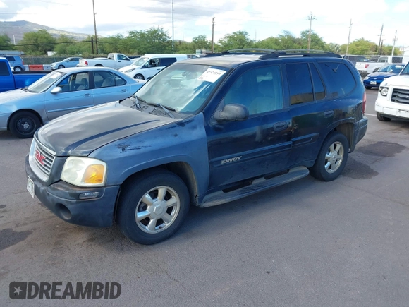 2002 GMC Envoy SLE z VIN 1GKDS13S922523317, wystawiony jako IAAI lot #42374259 z przebiegiem 185 686 mil mil oraz . Historia ofert i sprzedaży dostępna na DreamBid. Obrazek 2.