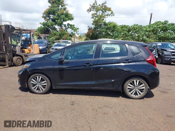 2015 Honda Fit EX-L with VIN 3HGGK5H89FM706018, listed as a IAAI auction lot 42417637 with 36,556 mi miles and . Bid and sale history available at DreamBid. Image 14.