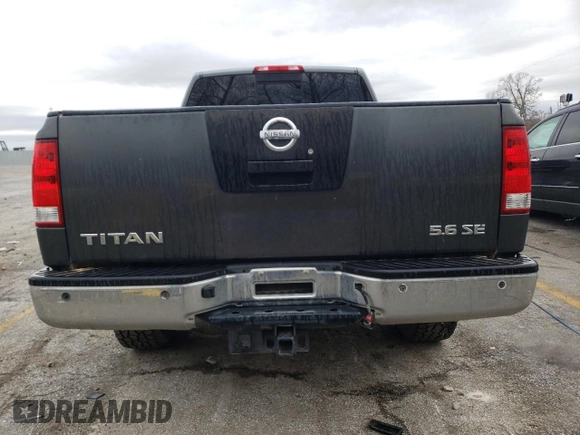 2010 Nissan Titan SE with VIN 1N6AA0CA9AN319565, listed as a Copart auction lot 44175775 with 214,303 mi miles and Salvage Title. Bid and sale history available at carsss.com. Image 6.