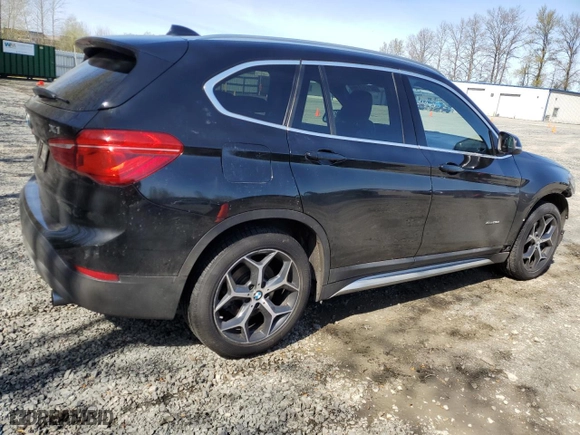 2018 BMW X1 xDrive28i with VIN WBXHT3C3XJ5K27379, listed as a Copart auction lot 52136315 with 79,428 mi miles and Clean Title. Bid and sale history available at carsss.com. Image 3.