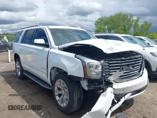 2016 GMC Yukon SLT z VIN 1GKS2BKC7GR444699, wystawiony jako IAAI lot #42324425 z przebiegiem 152 532 mil mil oraz . Historia ofert i sprzedaży dostępna na DreamBid. Obrazek 1.
