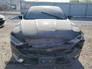 2017 Ford Fusion SE z VIN 3FA6P0H98HR179253, wystawiony jako Copart lot #52015345 z przebiegiem 99 883 mil mil oraz Czysty tytuł • Clean title. Historia ofert i sprzedaży dostępna na DreamBid. Obrazek 5.