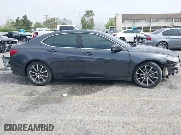 2016 Acura TLX V6 z VIN 19UUB2F33GA001903, wystawiony jako IAAI lot #42180265 z przebiegiem 185 198 mil mil oraz . Historia ofert i sprzedaży dostępna na DreamBid. Obrazek 14.