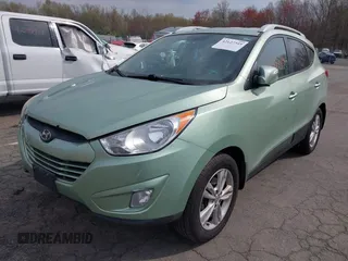 2013 Hyundai Tucson GLS with VIN KM8JU3AC7DU580229, listed as a IAAI auction lot 42127349 with 204,975 mi miles. Bid and sale history available at carsss.com. Image 2.