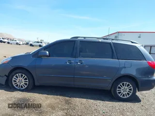 2009 Toyota Sienna XLE with VIN 5TDBK22C69S027767, listed as a IAAI auction lot 42029832 with 200,752 mi miles and . Bid and sale history available at DreamBid. Image 14.