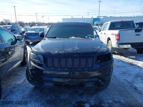 2015 Jeep Grand Cherokee Altitude with VIN 1C4RJFAG6FC724592, listed as a IAAI auction lot 41525448 with 173,306 mi miles. Bid and sale history available at carsss.com. Image 12.