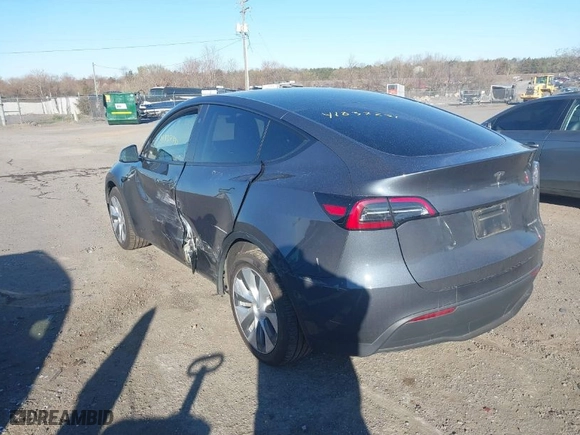 2023 Tesla Model Y Long Range with VIN 7SAYGDEE8PA140562, listed as a IAAI auction lot 41837231 with 30,847 mi miles. Bid and sale history available at carsss.com. Image 3.