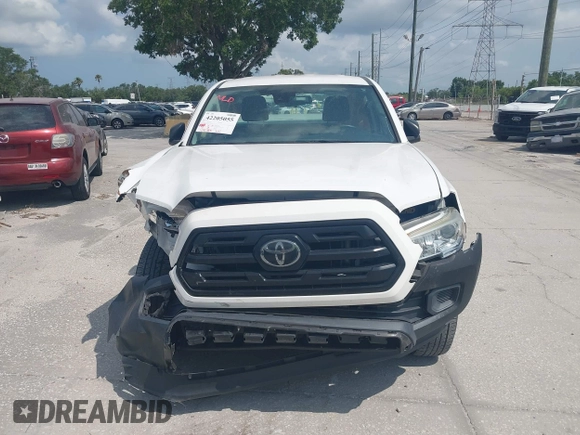 2018 Toyota Tacoma SR with VIN 5TFRX5GN6JX129435, listed as a IAAI auction lot 42205055 with 105,985 mi miles and . Bid and sale history available at DreamBid. Image 12.